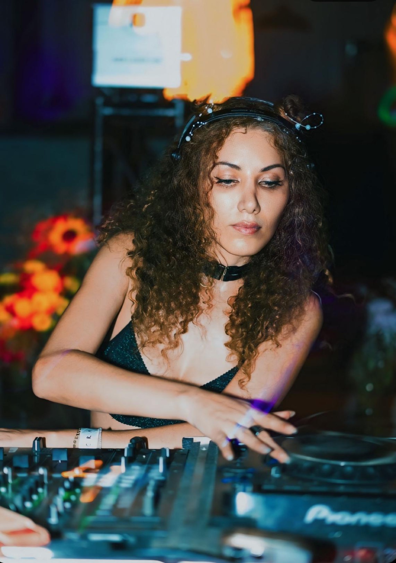 Hands on the mixer during a live set